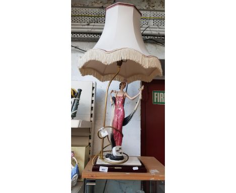 An Art Deco style figural table lamp. 