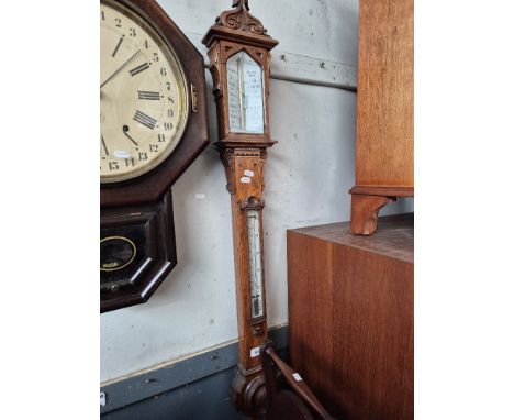 A Victorian Braham Bros oak stick barometer together with an American wall clock by Set Thomas. Condition- the case to the ba