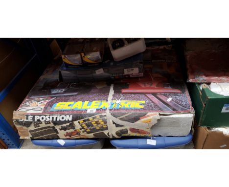 A collection of Scalextric items including two Subaru cars, two Porsche cars, powerbase upgrade kit, track, etc.