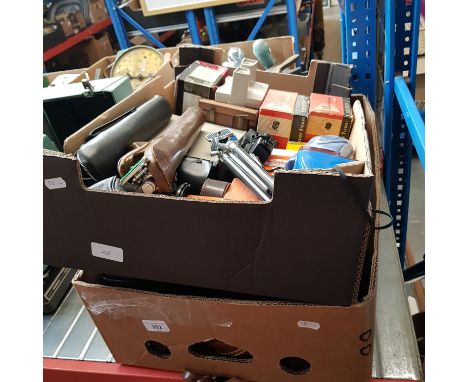 Two boxes of assorted items to include 2 Bolex cine camera, 4 other cine camera, 2 tripods, various 3d viewers and various sl