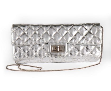 A Chanel silver quilted leather clutch/shoulder bag, modern, stamped to interior and numbered 12039096, mirror to inside flap