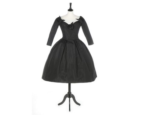 A Christian Dior couture black faille cocktail dress, 'Fuseau' (Spindle) line, Autumn-Winter, 1957, un-labelled, probably Pat