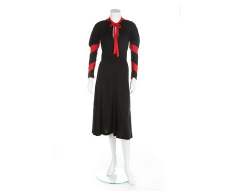 An Ossie Clark 'Heavenly Twins' black and red wool jersey dress, circa 1970, printed black on white satin label and size 12, 