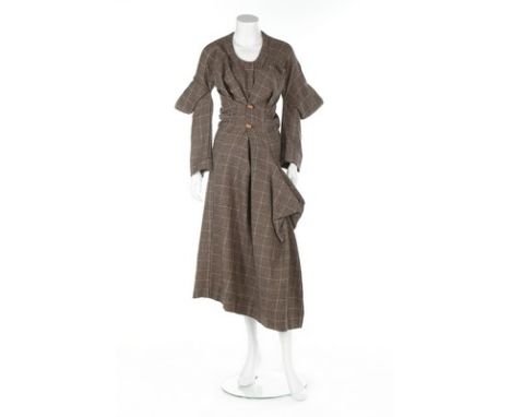 A Westwood/McLaren checked wool dress, 'Witches' collection, Autumn-Winter, 1983-84, World's End labelled, with pointed sleev