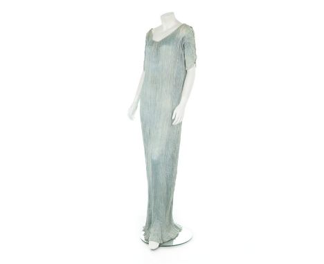 A Mariano Fortuny pale blue pleated silk Delphos gown, 1920-30, signed in a rear seam selvedge, the short sleeves with criss-