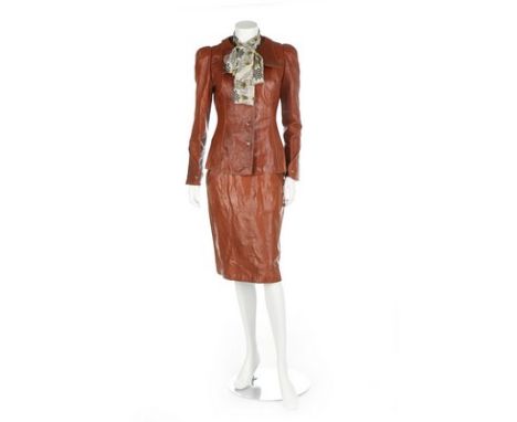 A Bill Gibb leather ensemble, Autumn-Winter, 1972, and two blouses, all labelled and size 12, the jacket and waistcoat with e