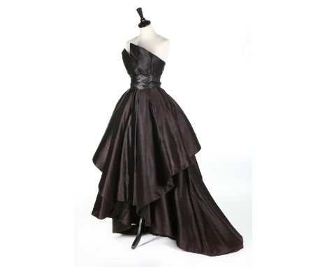 An early and important Christian Dior couture black satin evening gown, probably 'Ailée' (winged) line, Autumn-Winter, 1948, 