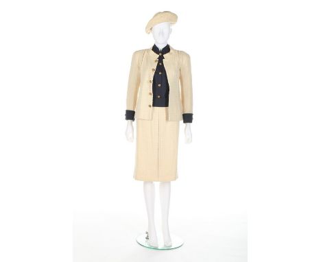 A Chanel ivory tweed ensemble, probably American Patron Originale, 1966, large label numbered 31303, comprising: jacket with 