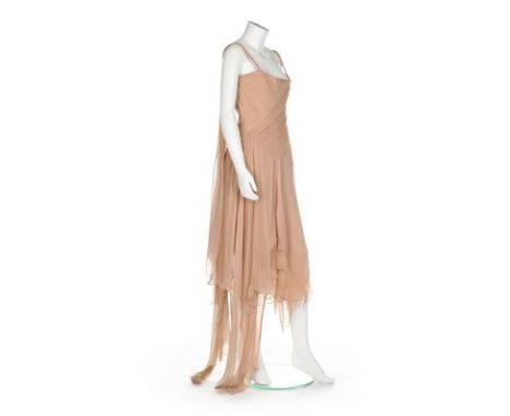 An Alexander McQueen nude chiffon evening gown, 'Irere' collection, Spring-Summer, 2003, woven grey label and size 40, the co