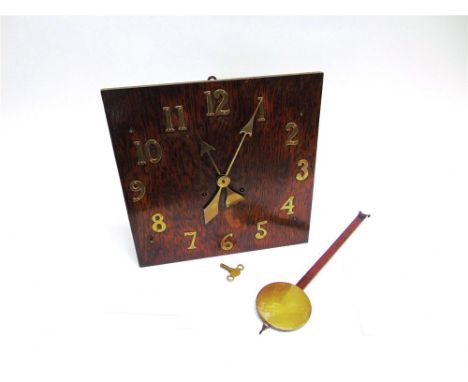 AN OAK CASED WALL CLOCK  with spring driven movement, probably American, the Arabic hour markers and conforming hands in the 