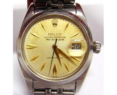 ROLEX WRISTWATCH Oyster Perpetual, Air-King Date, a gentleman's stainless steel wristwatch, the white dial with gilt danger b