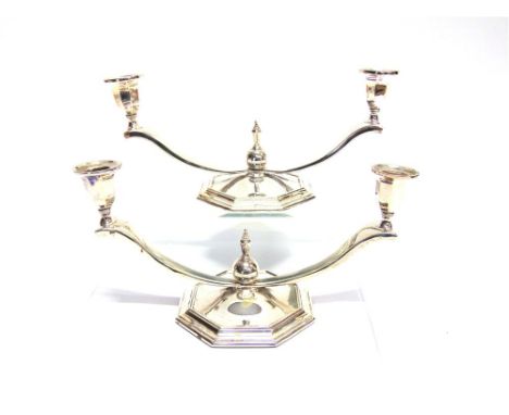 A PAIR OF 1950's ELECTROPLATED TWO LIGHT CANDELABRAS on marked, the octagonal base with two low swept branches with a finial 