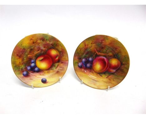 A PAIR OF ROYAL WORCESTER SMALL PLATES  with painted fruit decoration signed 'E Townsend', 15.5cm diameter, puce printed mark