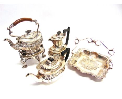 A COLLECTION OF PLATED WARES including a three piece tea service; a hot water jug; a large salver; a kettle on stand; and a l