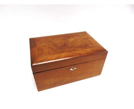 A VICTORIAN WALNUT SEWING BOX,  with lift-out tray, 30cm wide 20cm deep 16cm high, containing a collection of assorted items 