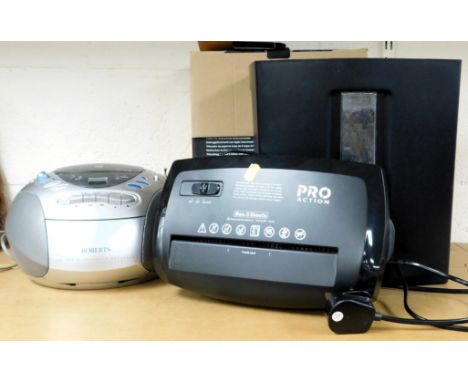 A Pro Action shredder, and a Roberts CD radio cassette recorder. 