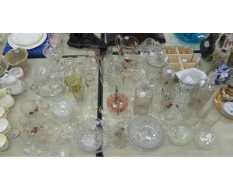 A QUANTITY OF CUT AND MOULDED GLASSWARE'S  TO INCLUDE; A PAIR OF DECANTERS, INSCRIBED H & R. CELERY VASE, BOWLS, GLASSES ETC.