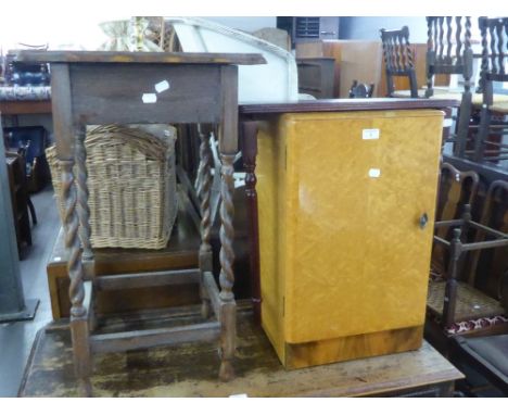 AN OAK OBLONG OCCASIONAL TABLE ON SPIRALLY TWISTED LEGS, A MAHOGANY COFFEE TABLE (A.F.) AND AN LIGHT OAK BEDSIDE CUPBOARD (3)