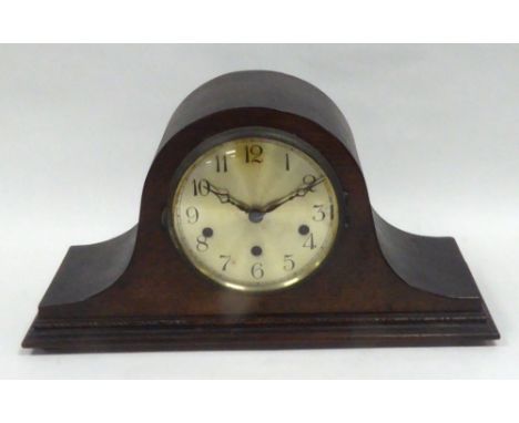 AN OAK CASED NAPOLEONS HAT SHAPED MANTEL CLOCK 