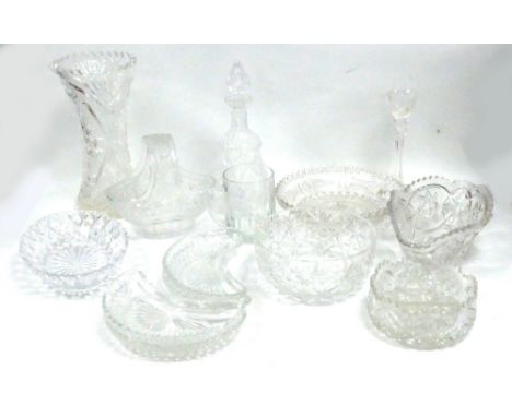 A SET OF FOUR CUT GLASS CRESCENT SHAPED SIDE SALAD DISHES,  A LARGE CUT GLASS WAISTED FLOWER VASE (SLIGHT CHIP TO RIM) A LARG