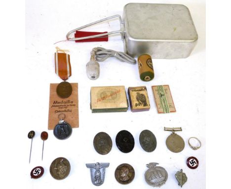 A Small Collection of German Third Reich Militaria, including a Winter Campaign in Russia medal with paper envelope, three Wo