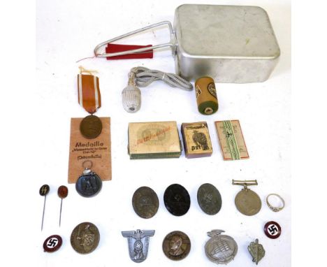 A Small Collection of German Third Reich Militaria, including a Winter Campaign in Russia medal with paper envelope, three Wo