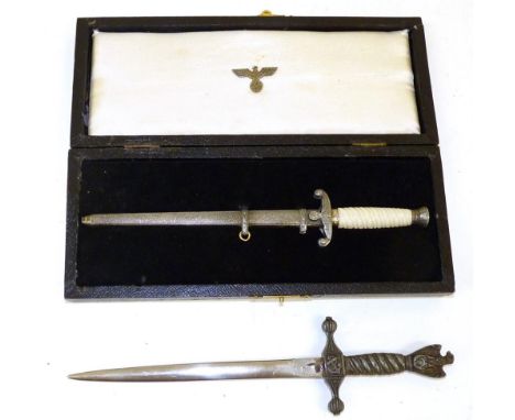 Two German Paperknife Daggers, one modelled as an Army officer's dagger with plated hilt, wrythen fluted cream plastic grip a