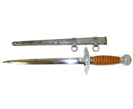 A German Third Reich Luftwaffe Dagger, 2nd Pattern, the 25cm double edge steel blade etched with maker's mark of a seated kin