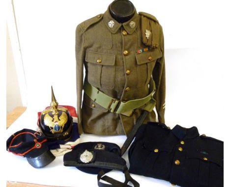 A First World War Corporal's Khaki Tunic to the Border Regiment, with brass buttons and shoulder titles, white metal collar b