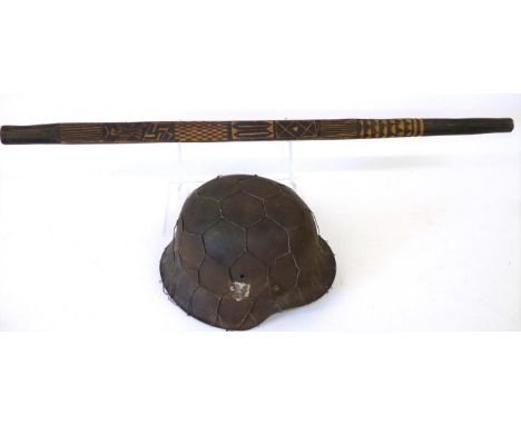 A German Third Reich M42 Helmet Shell, with aluminium liner band, later SS runes decal and chicken wire attachment (relic con