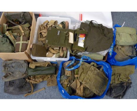A Large Quantity of Military Surplus Equipment, circa 1950's onwards, including webbing straps, spats, rucksacks, ammunition 