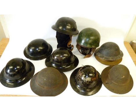 A British Second World War Despatch Rider's Helmet, with bottle green paint, with cushioned leather liner stamped BMB 1941 si