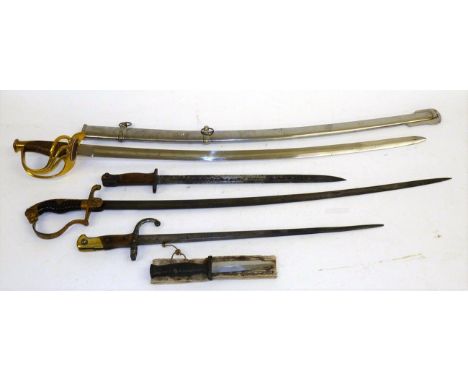 An Imperial German Army Officer's Sword, with 81cm single edge fullered steel blade, gilt painted steel stirrup hilt with lio