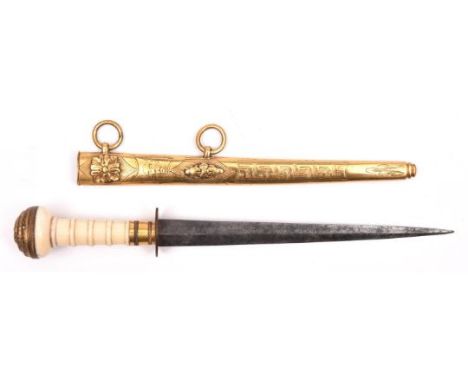 A Georgian naval dirk, c 1810, blade 6" with traces of etched decoration for its entire length, gilt brass hilt, the guard em