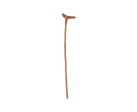 A Boer War period St Helena Prisoner of War carved walking stick, the slender haft carved "ST. HELENA P.O.W" and with antelop