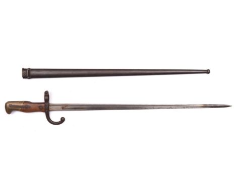 A French 1874 pattern Gras bayonet, the blade marked "St Etienne 1878", in its scabbard, the bayonet and scabbard with matchi