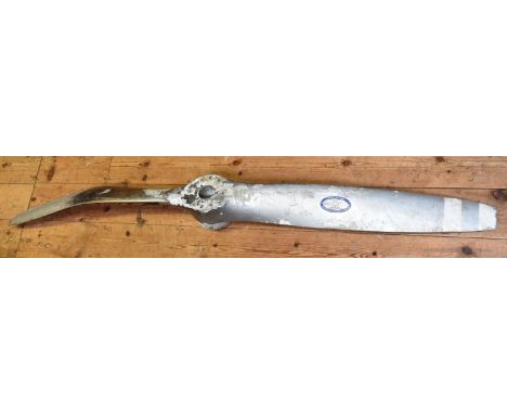 An aluminium propeller from a modern light aircraft. The aircraft was believed to have crashed and one blade of the propeller