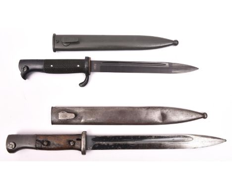 A post war German (?) bayonet, blackened blade 7½" with narrow fullers, etched "TSR", blackened hilt with chequered black gri