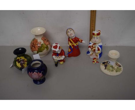 Group Lot - Three various small Moorcroft vases and a further candlestick, all showing signs of restoration together with thr