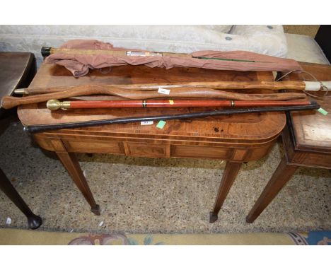 Mixed Lot: Four assorted walking sticks to include a brass mounted example with internal flask