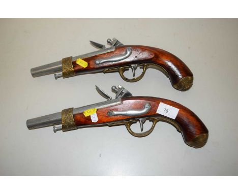 A pair of reproduction flintlock piston - wall display pieces