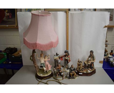 Group of Capodimonte figures and a further table lamp