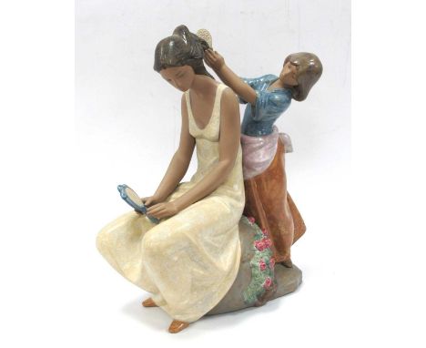 A Lladro Matt Glazed Figure Group 'Little Hairdresser', impressed No 2430, printed mark, 37cm high.Good condition, visible gl