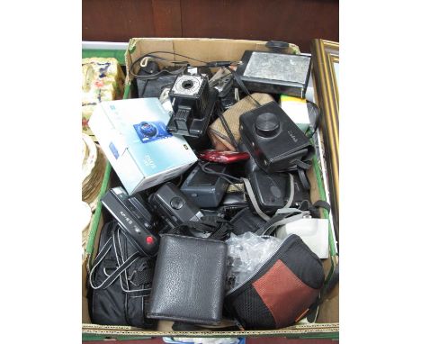 Cameras; A quantity of cameras to include some examples from Polarid, Kodak, Konica, Panorama, Minolta and some modern point 
