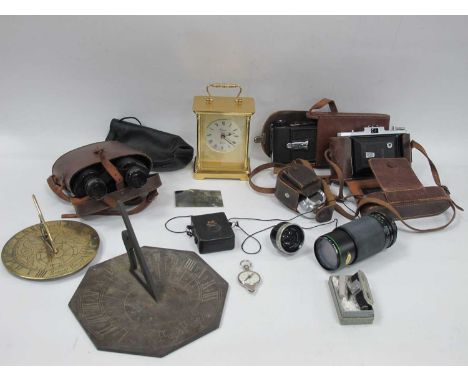 Vislander Binoculars, in case, Rapport clock, sundials, cameras, lenses, etc:- One Tray.