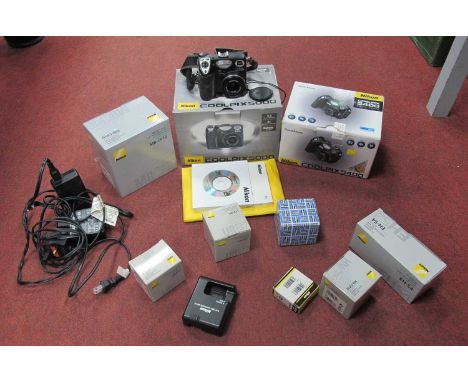 Nikon; Coolpix 5000, Coolpix 5400 cameras boxed with accessories, other boxed accessories to include battery pack, AC adapter