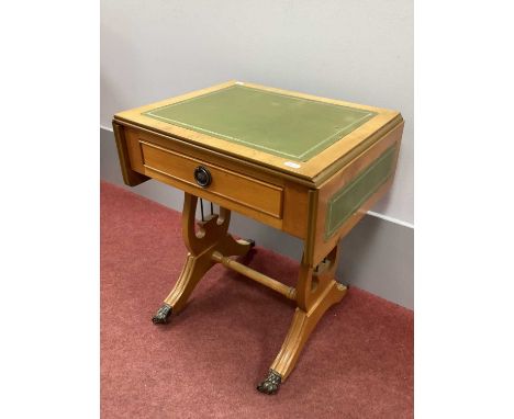 Small Repro Sofa Table, with green leather inserts, lyre supports, on swept supports, 45cm wide.