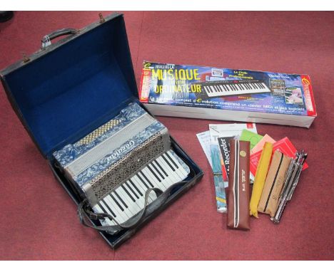 Geraldo cased accordion, boxed keyboard and a small collection of recorders including Yamaha and two Aulos with sheet music a