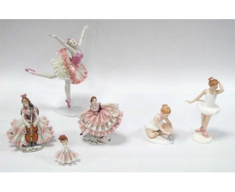 A Continental 'Schwanensee' Figurine of a Ballerina No' 9479, three Dresden figurines in lace dresses, two Royal Doulton figu