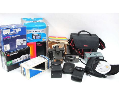 Cameras to include two boxed Polaroid examples, JVC camcorder in case, Tamron 80-120mm f=3.8-4 lens, other boxed cameras from
